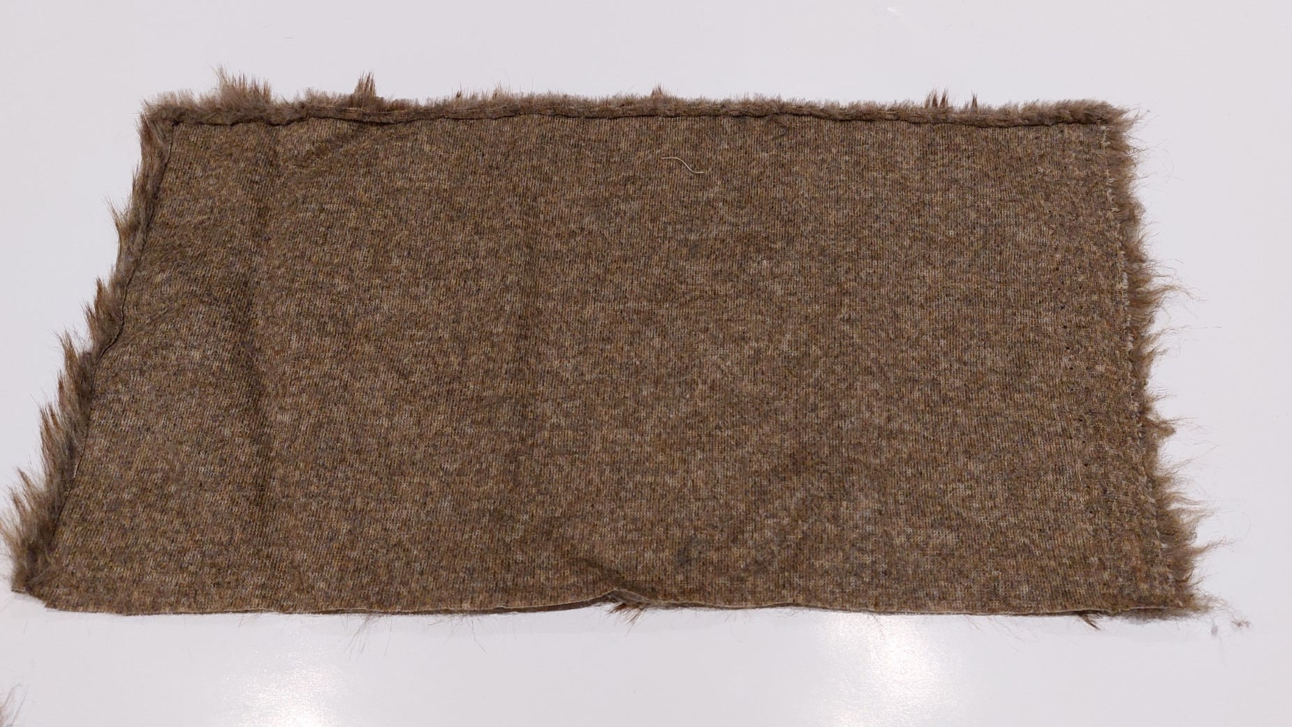 Backside of the fur with hand sewing