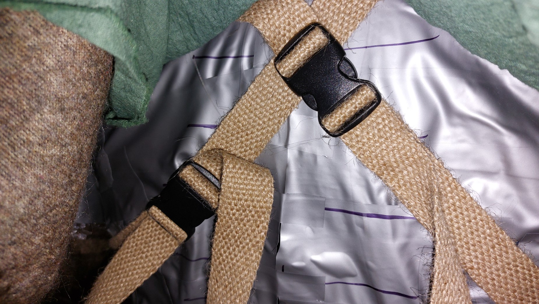 Clasps at the back of the hood